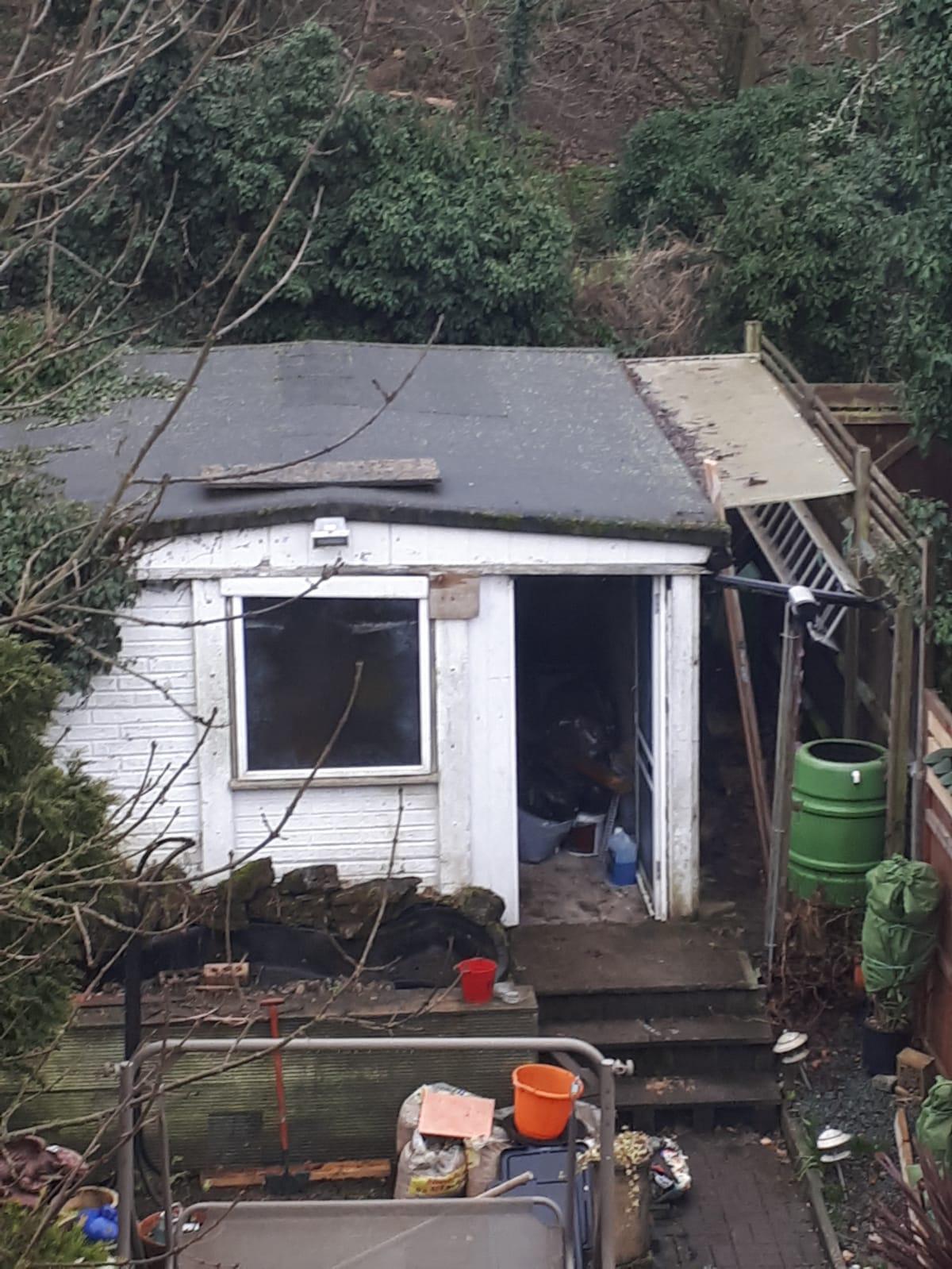 Before: deteriorating garden shed