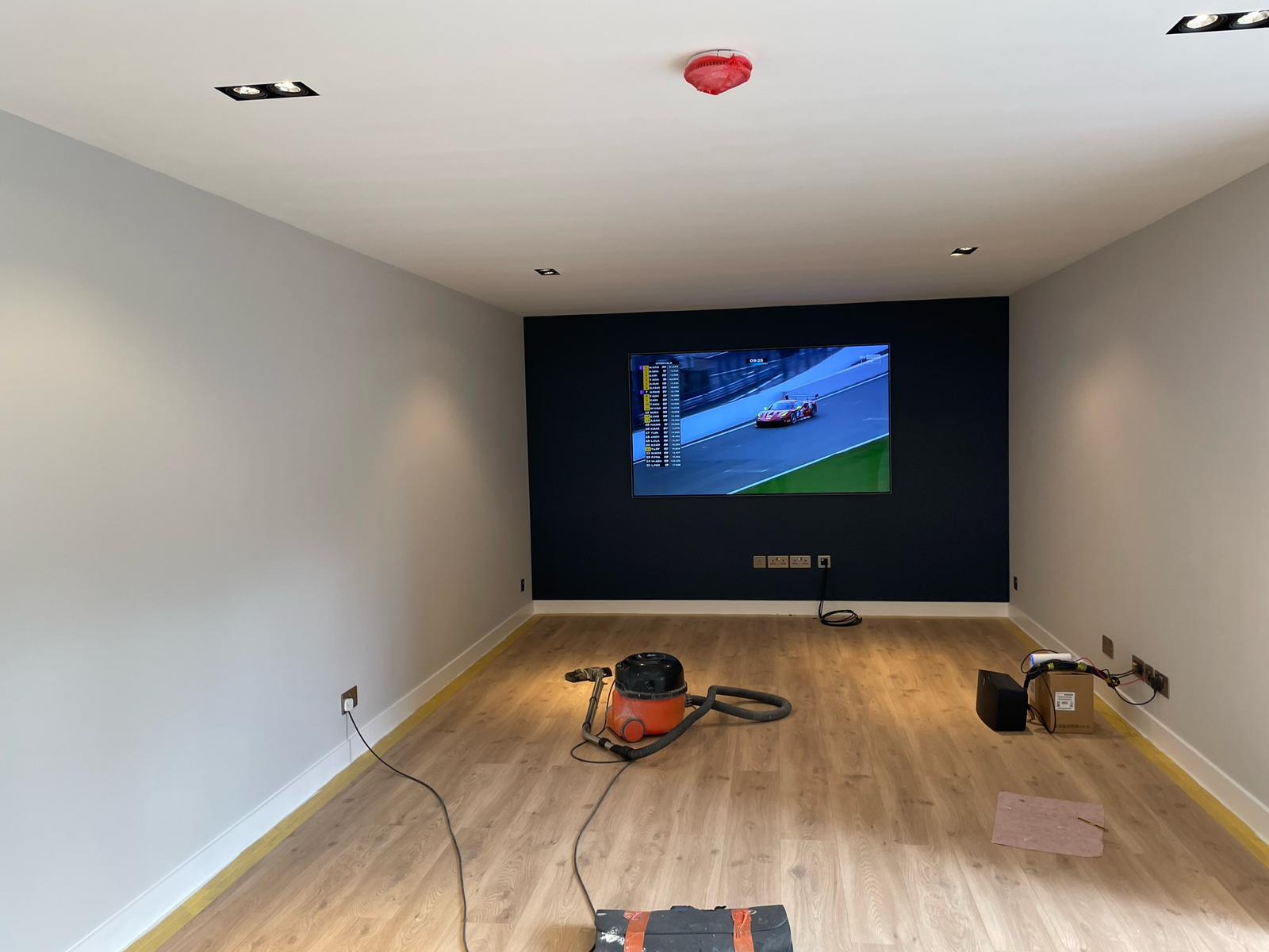 Home cinema with projector and large screen