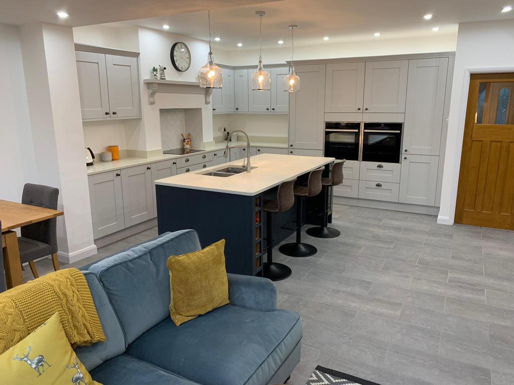 Modern kitchen with pendant lights and island